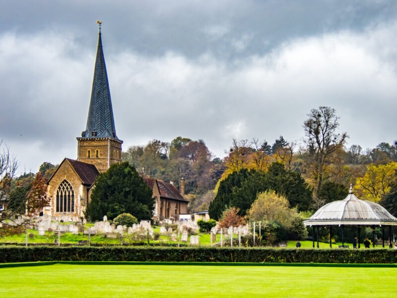 View of Church of St Peter and St Paul, and grounds in Godalming. Surrey UK