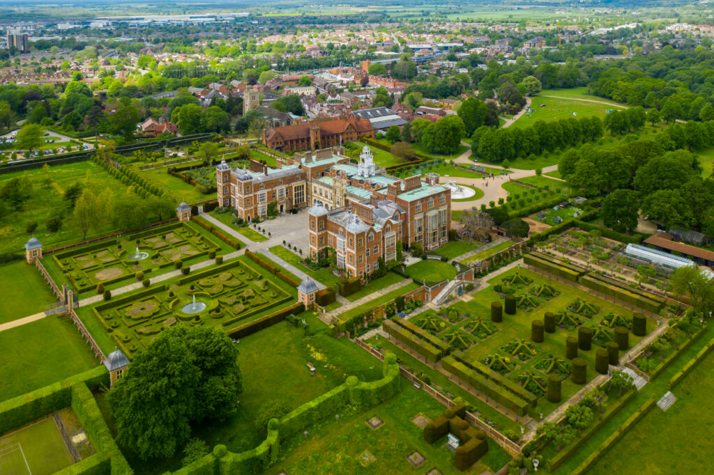 Aerial view of Hatfield House and sculptured gardens, near Hatfield, UK