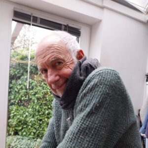 Elderly gentleman with Parkinsons being cared for at home