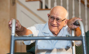 Rehab health care-elderly man with zimmer frame